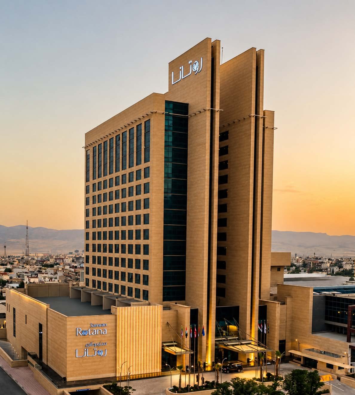 Rotana Hotel towers at dusk, Slemani — international hospitality reference