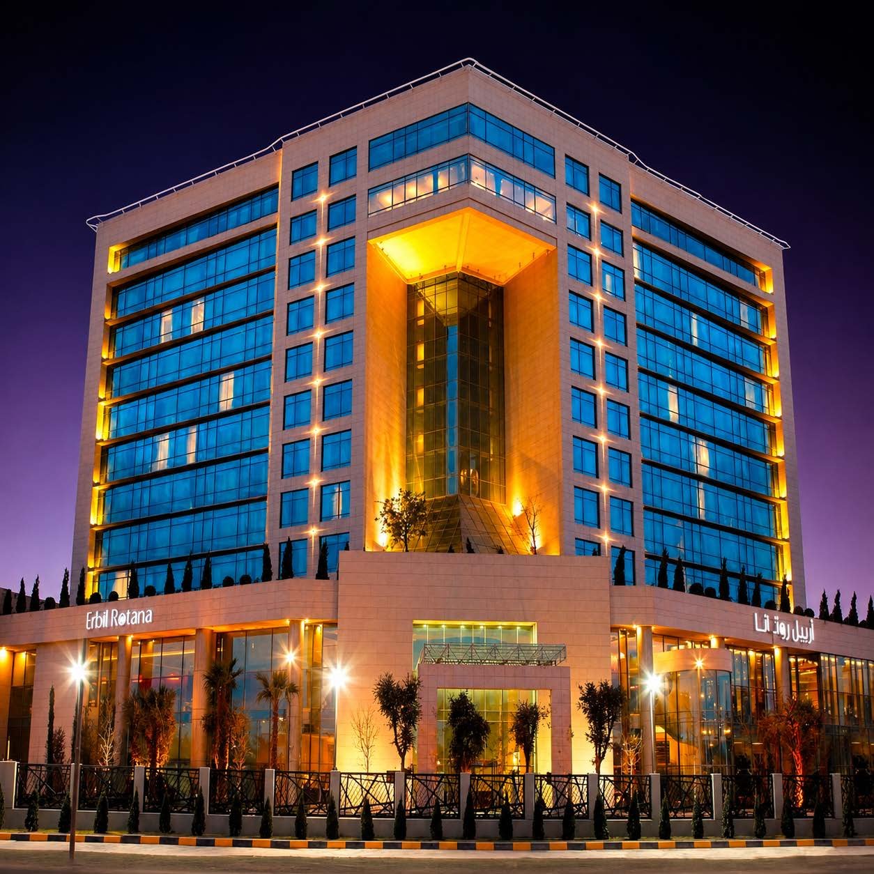Rotana Hotel towers illuminated at night, Slemani