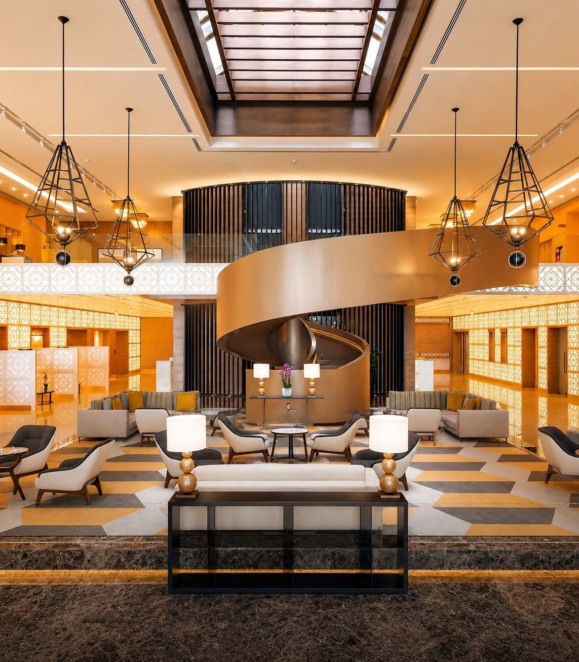 Grand hotel lobby with a wood spiral staircase and skylight, hospitality sector reference project